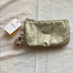 Kipling Silver Beige Handbag with 5 pouches
